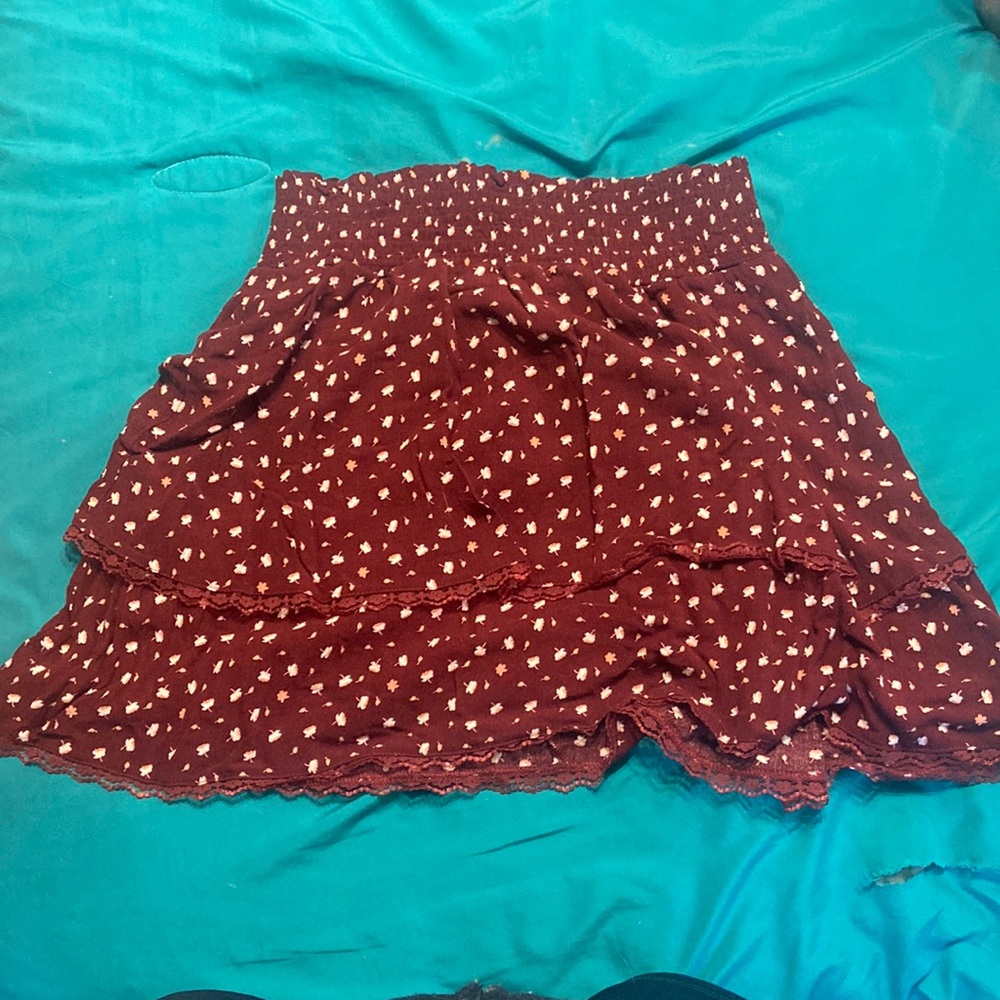 red skirt with flowers